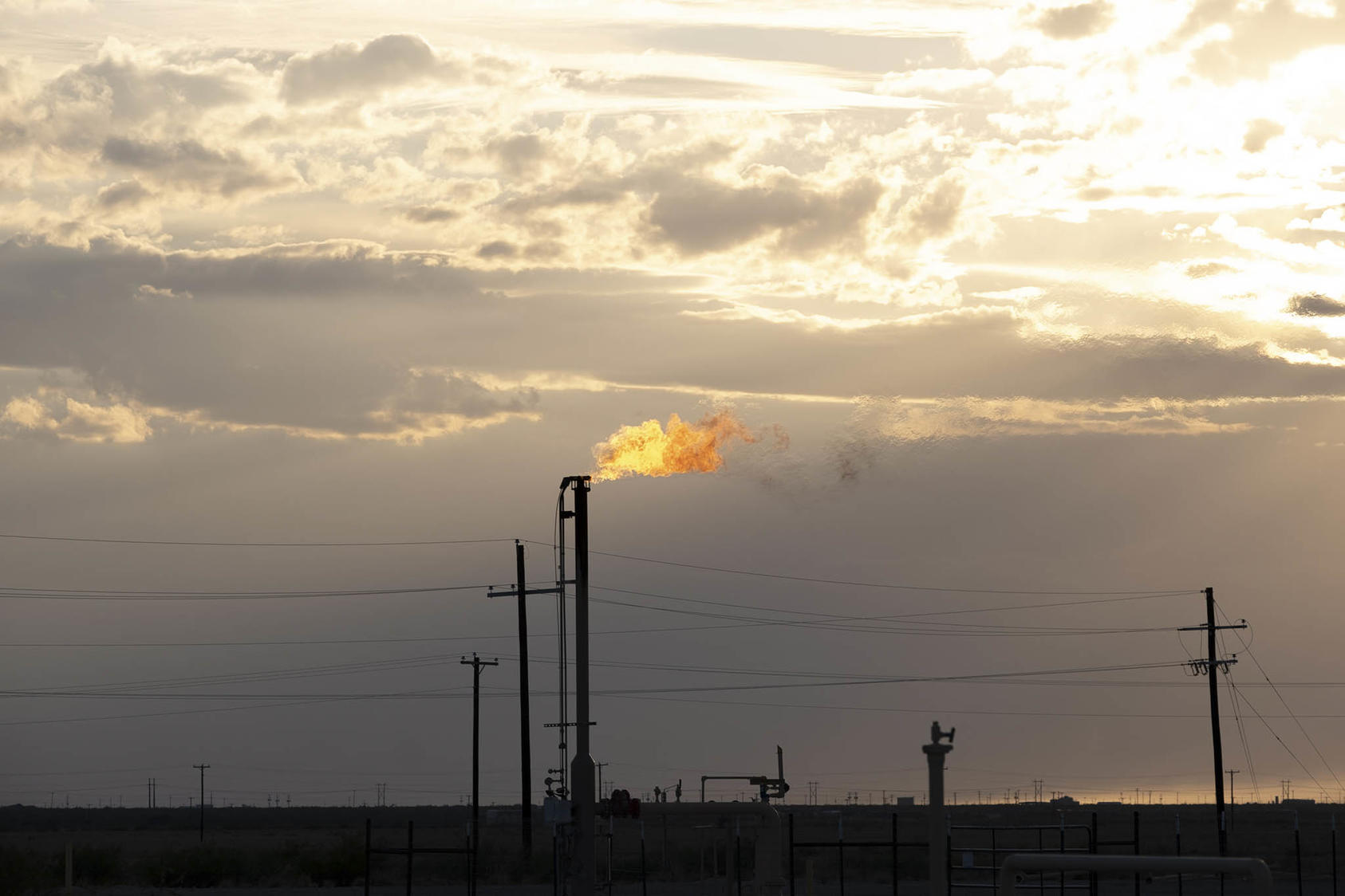 A gas flare in the Permian Basin, in Pecos, Texas, on October 8, 2019. In the short term, methane is about 80 times more potent than carbon dioxide. (Jessica Lutz/The New York Times)
