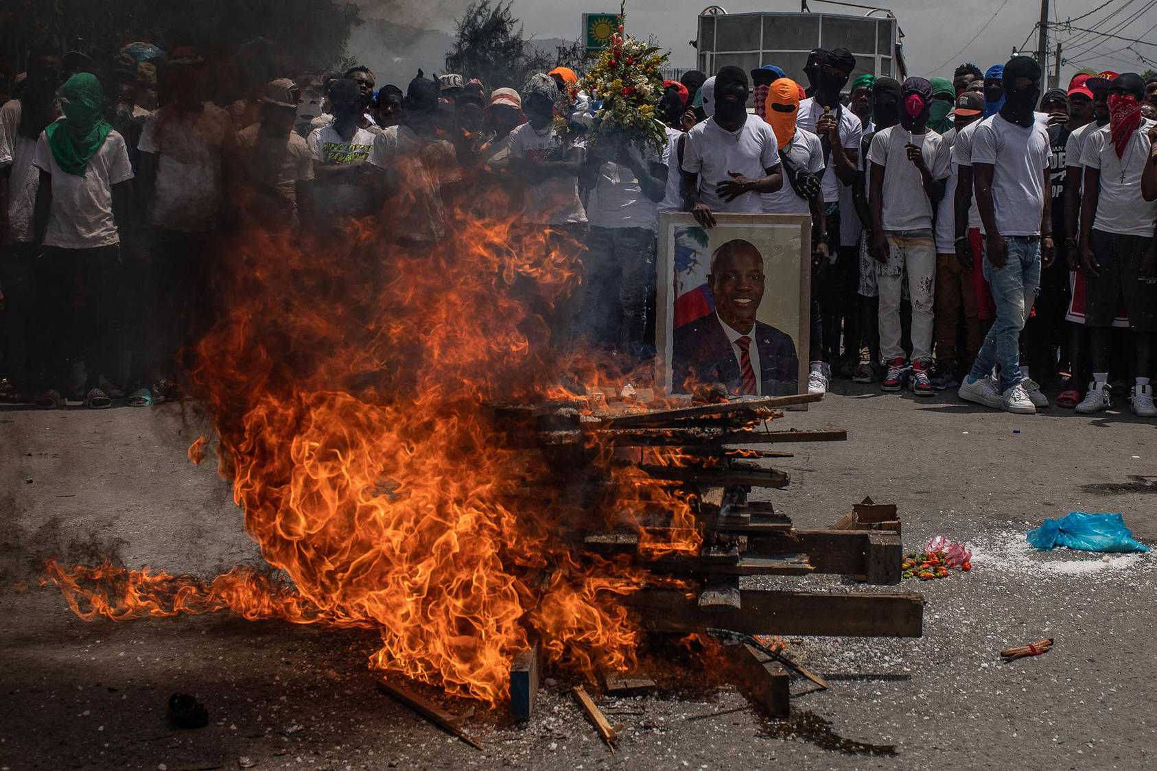 Gang members at a protest after the assassination of Haitian President Jovenel Moïse, in Port-au-Prince, July 26, 2021. (Victor Moriyama/The New York Times)