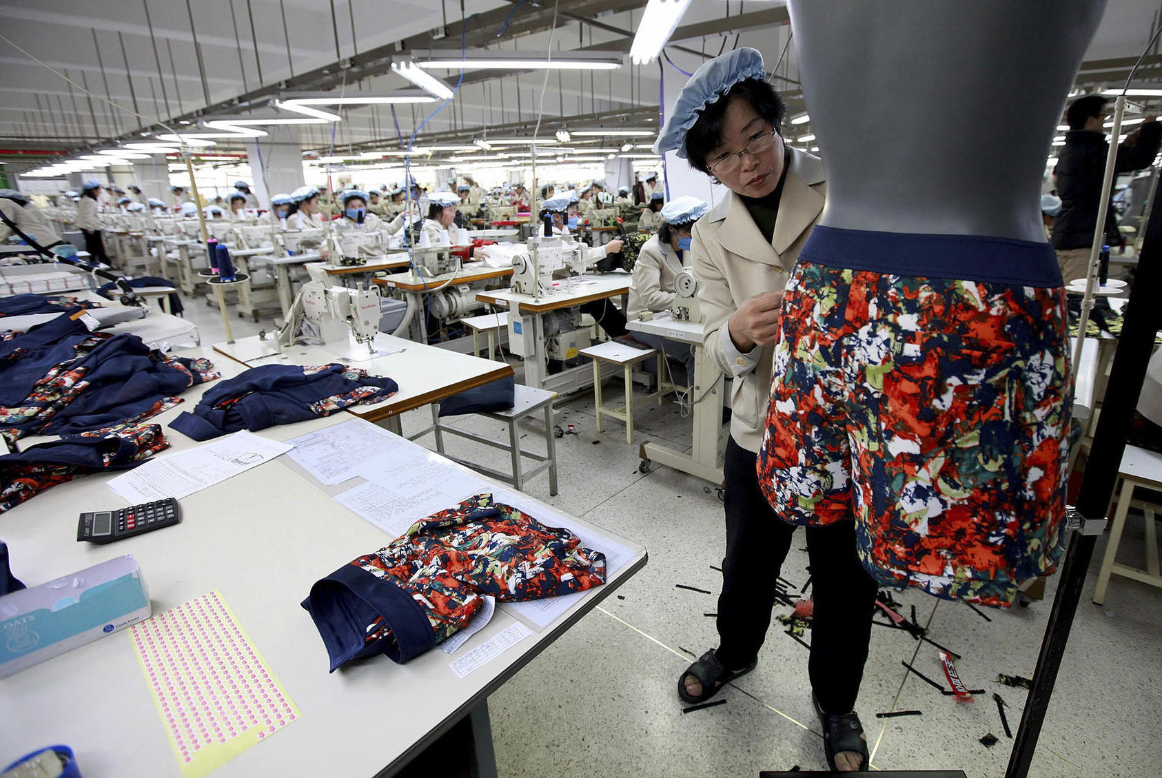 North Korean workers at an apparel factory in the Kaesong industrial park in North Korea on Dec. 19, 2013. South Korea shut down the complex in 2016 in retaliation for North Korea’s rocket launch and nuclear test. (Park Jin-Hee/Pool via The New York Times)