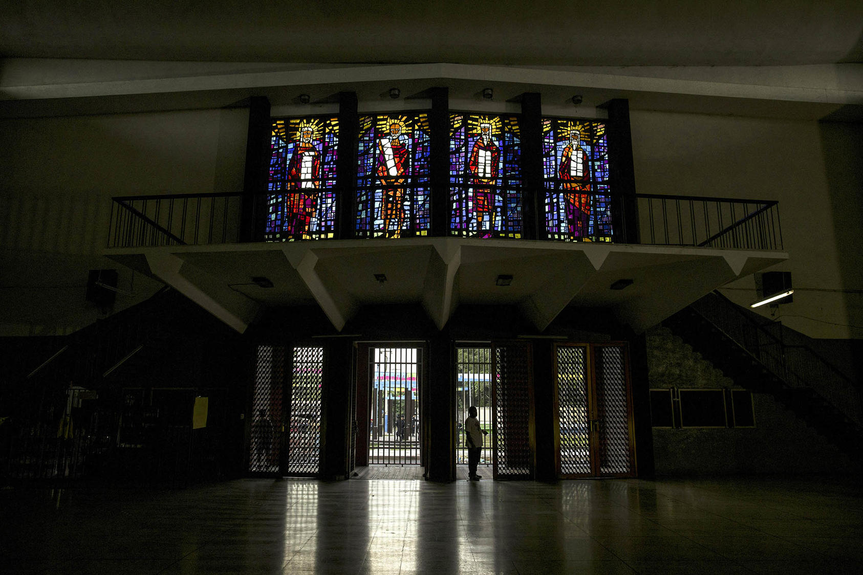 A man opens the doors of Santo Domingo Church in Managua, Nicaragua. August 4, 2022. (Inti Ocón/The New York Times)