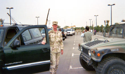 In 2003, Paul Hughes prepares to drive from Kuwait to Baghdad with the U.S. team preparing for reconstruction in Iraq.