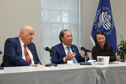 Ambassadors John Negroponte and Nguyen Quoc Dzung discuss postwar reconciliation with historian Lien-Hang Nguyen at USIP.
