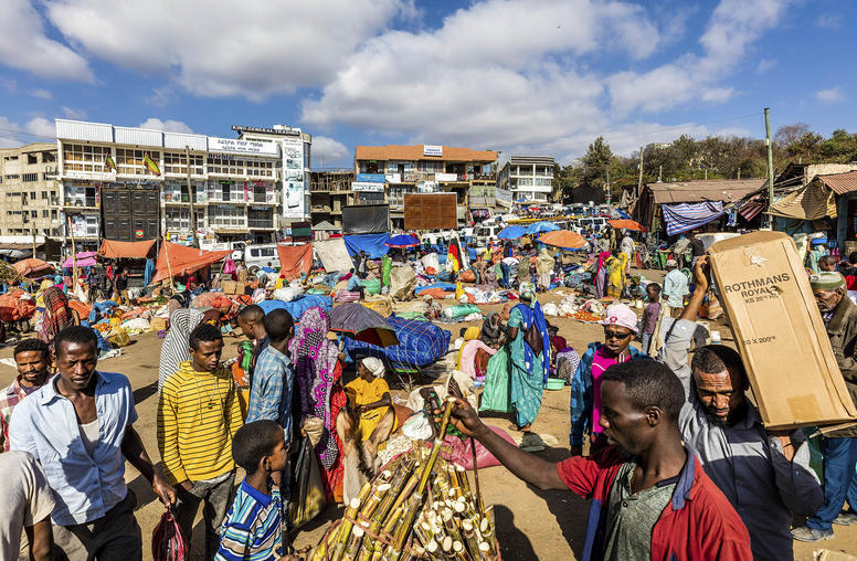 Throngs of shoppers and traders in the Christian market, outside the Showa Gate of Harar Jugol, Ethiopia, Feb. 10, 2019. (Marcus Westberg/The New York Times)