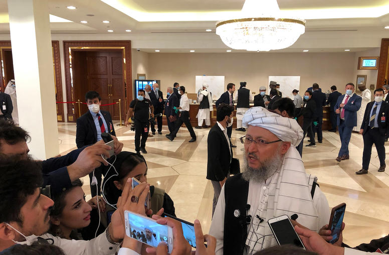 Abdul Salam Hanafi, a member of the Taliban delegation, speaks with reporters at the peace talks with the Afghan government in Doha, Qatar, on Saturday, Sept. 12, 2020. (Mujib Mashal/The New York Times)