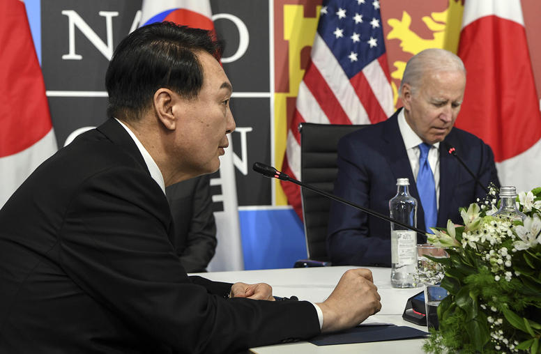 President Yoon Suk-yeol of South Korea, left, speaks during a meeting with President Joe Biden of the U.S. and Prime Minister Fumio Kishida of Japan, not pictured, at the NATO summit in Madrid on Wednesday, June 29, 2022. (Kenny Holston/The New York Times)