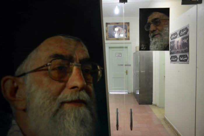 Portraits of Ayatollah Ali Khamenei, Iran's supreme leader, flank a corridor in the consular section of the former U.S. Embassy in Tehran, Oct. 31, 2013. (Kaveh Kazemi/The New York Times)