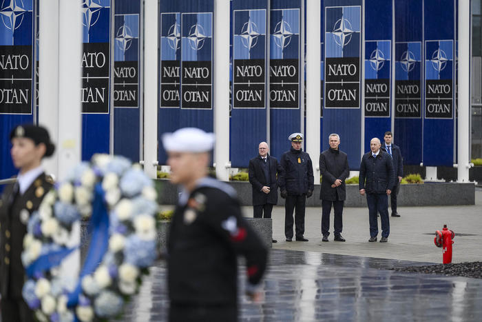NATO Secretary-General Jens Stoltenberg (center right) and other NATO officials attend a wreath laying ceremony during the alliance’s 75th anniversary celebration of the alliance in Brussels, April 4, 2024. (NATO)