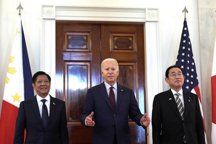 President Joe Biden with Philippine President Ferdinand R. Marcos Jr., left, and Japanese Prime Minister Fumio Kishida before a trilateral meeting at the White House in Washington, April 11, 2024. (Yuri Gripas/The New York Times)