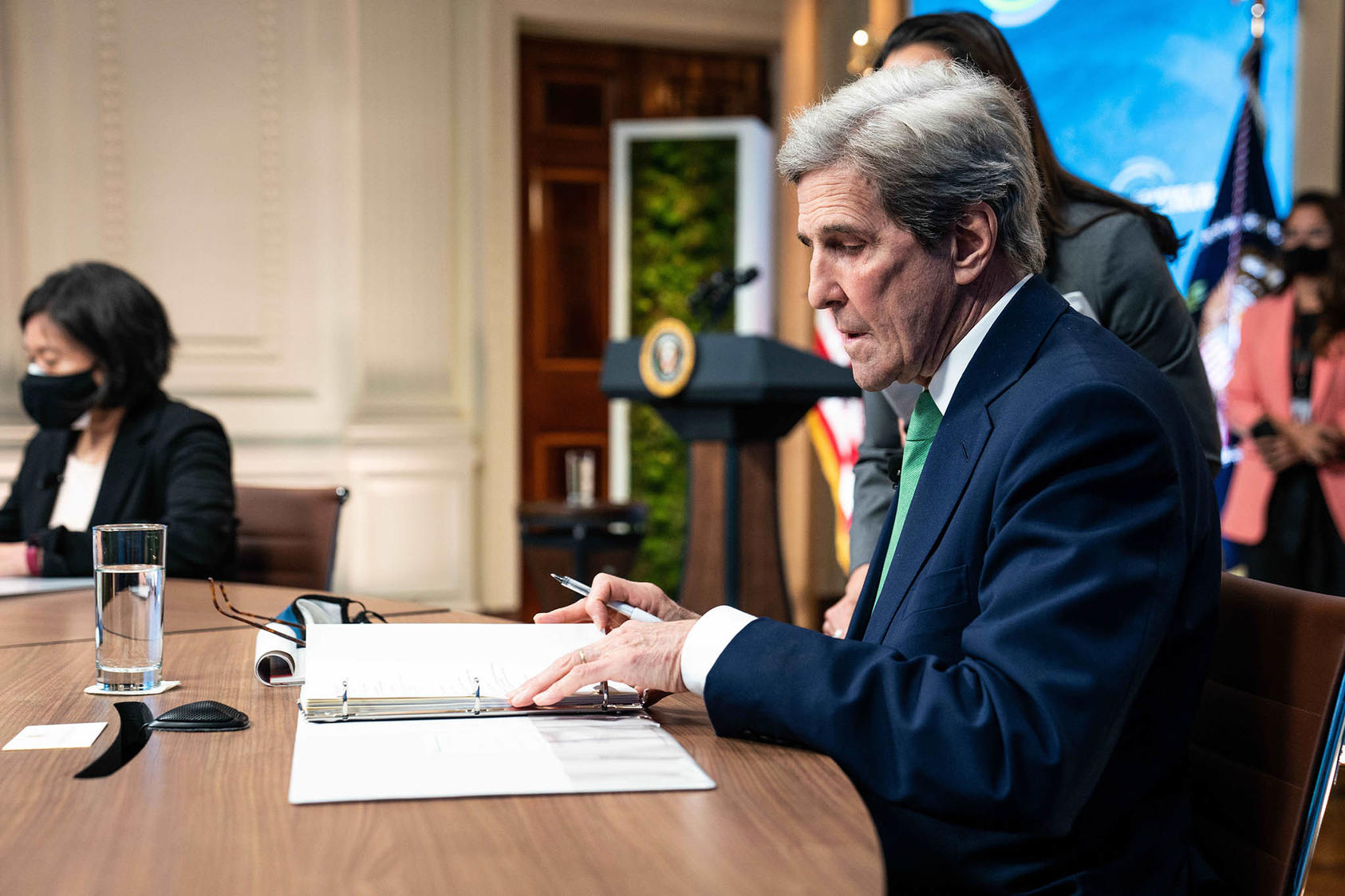 Special Envoy John Kerry looks at his notes before the virtual Leaders Summit on Climate in Washington, D.C. April 23, 2021. (Anna Moneymaker/The New York Times)
